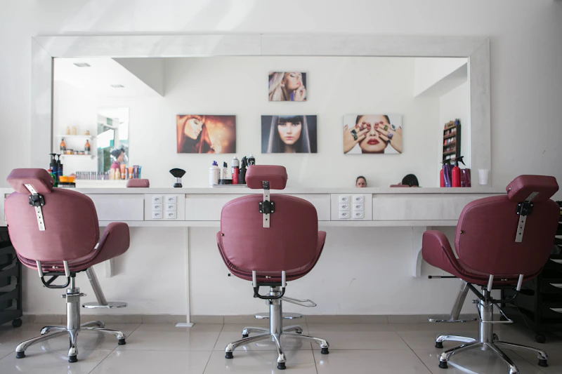 Salon interior with styling chairs and mirrors